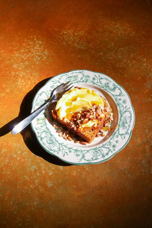 pumpkin bread with pumpkin spice honey drizzled on top