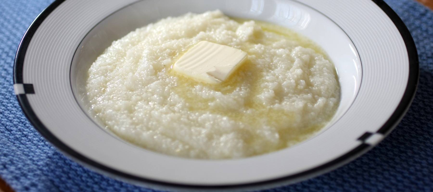 a bowl of Haygood Mill grits with a pat of butter