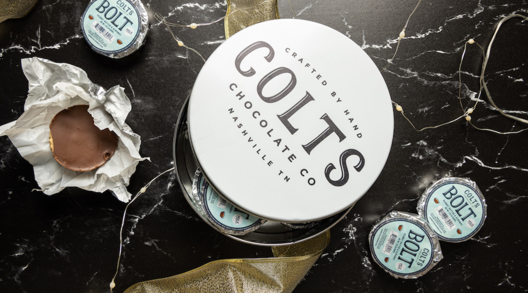 A gift tin of Colts chocolates 