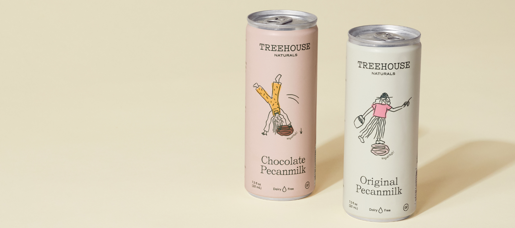 Two cans of Treehouse Naturals pecan milk