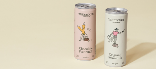 Two cans of Treehouse Naturals pecan milk