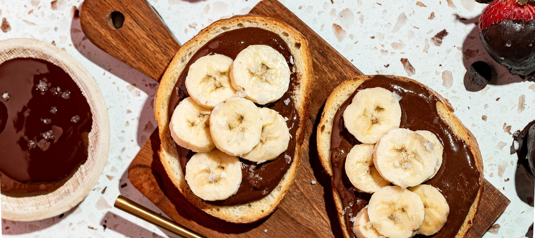 Georgia Grinders Healthy Nutella spread on toast with banana slices