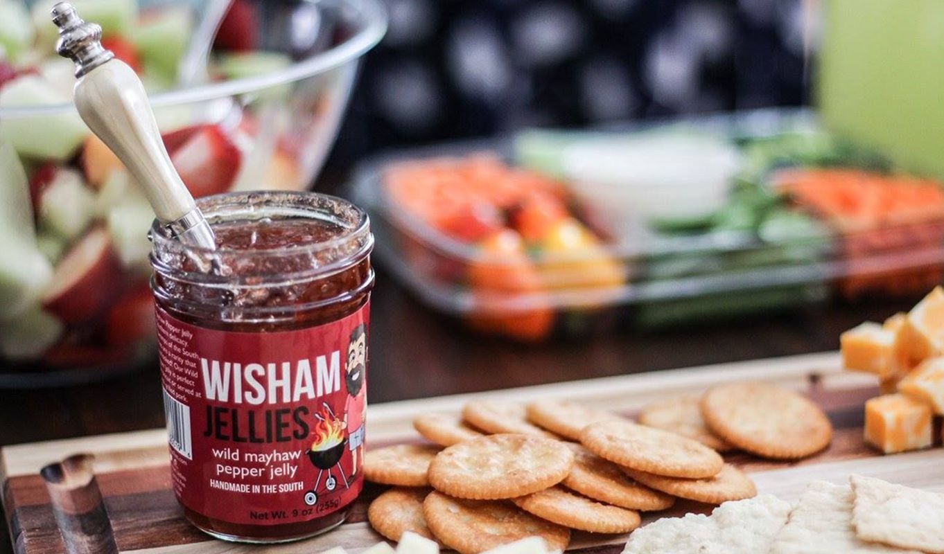 Wisham Jellies' Mayhaw pepper jelly on a cheese plate
