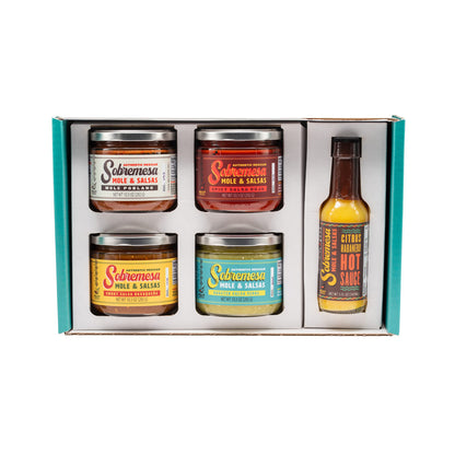 Collection of Saboresina hot sauces and salsas in a box on a white background