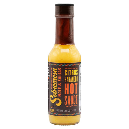 Bottle of Sobremesa's Citrus Habanero hot sauce with a black label on a white background