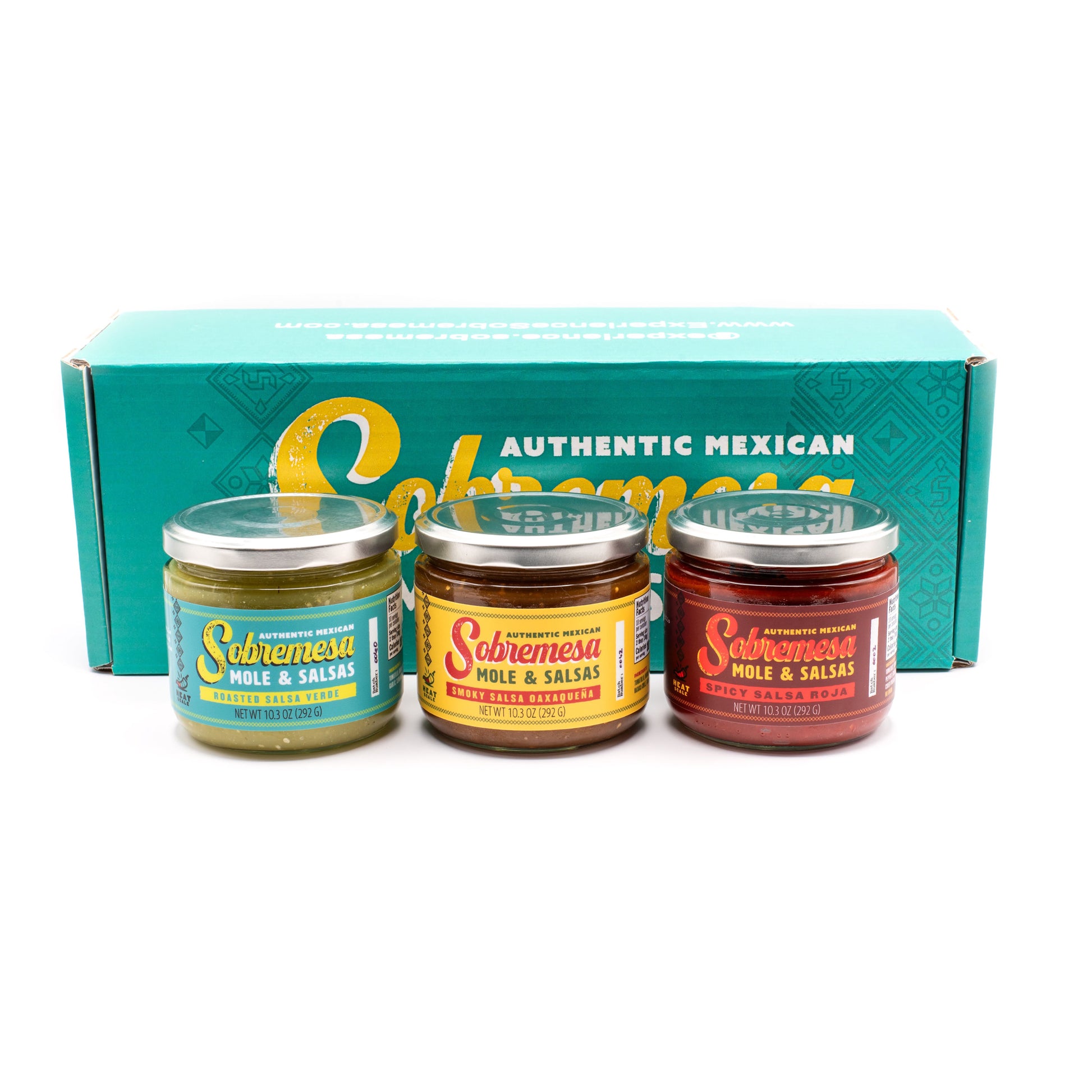 Three jars of Sabremesa sauce in front of a teal box with the brand name.