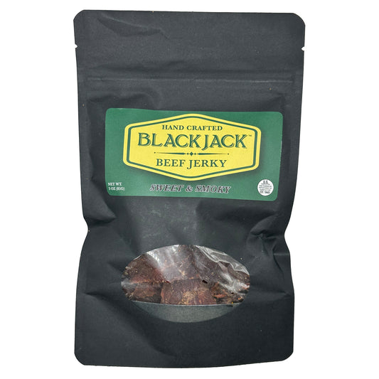 Black bag of Food for the Southern Soul's Blackjack Beef Jerky with a green label on a white background