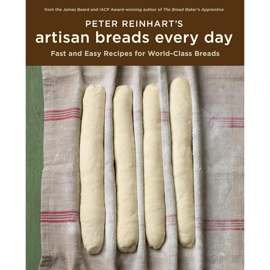 Book cover for 'Peter Reinhart's Artisan Breads Every Day' featuring five unbaked bread loaves on a striped linen cloth below a brown title banner.