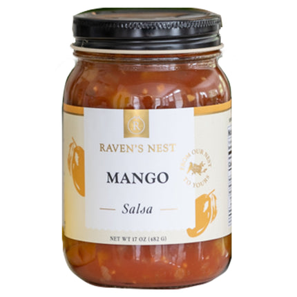 A jar of "Raven's Nest Mango Salsa" with a black lid and a white label featuring the brand logo