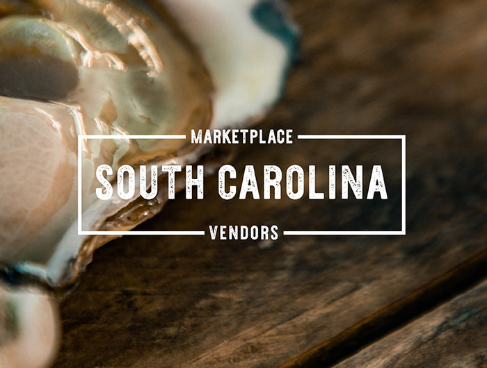Raw oyster with South Carolina Vendors graphic